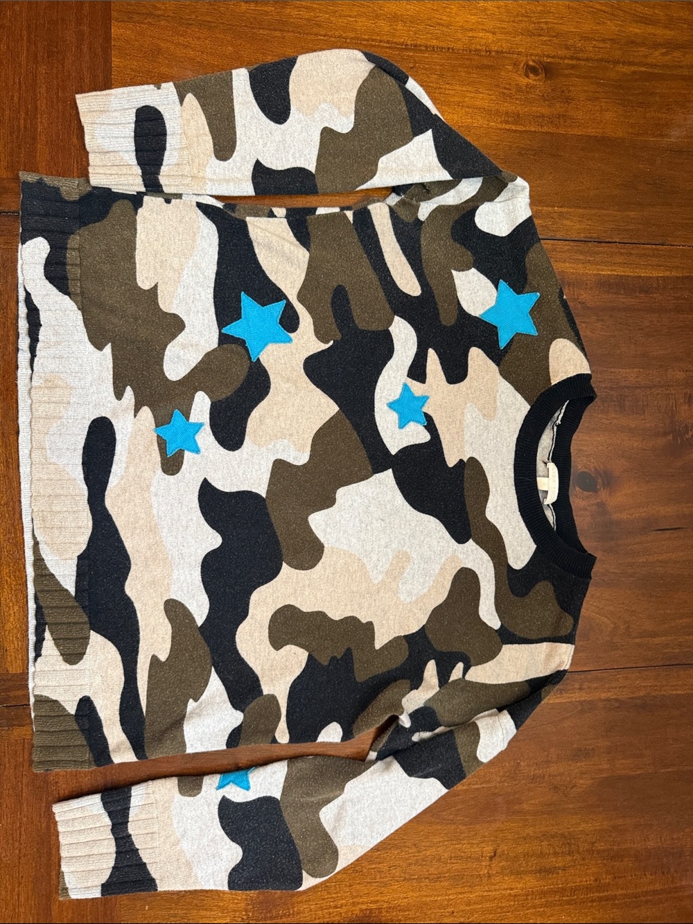 Lisa Todd Camo Star Sweater in Green, Black, Cream with Bright Blue Stars